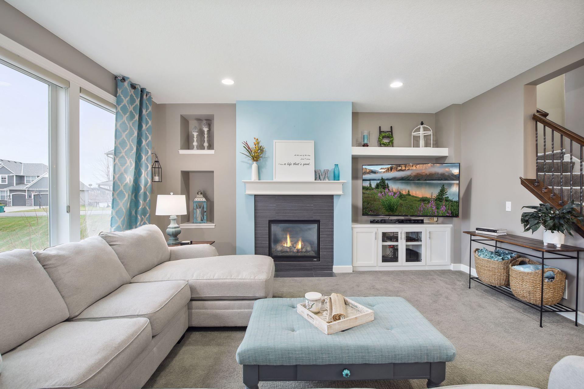 The living room has lovely architectural accents.