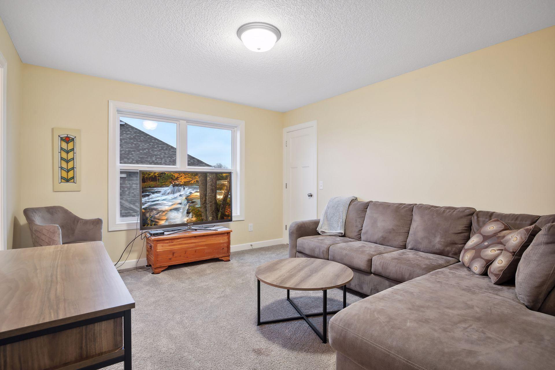 The fourth bedroom up is large enough for TV/ family area or playroom.