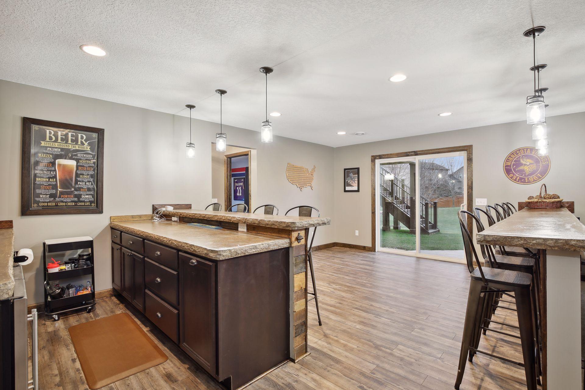 Walk-out to the lovely yard and hot tub area.