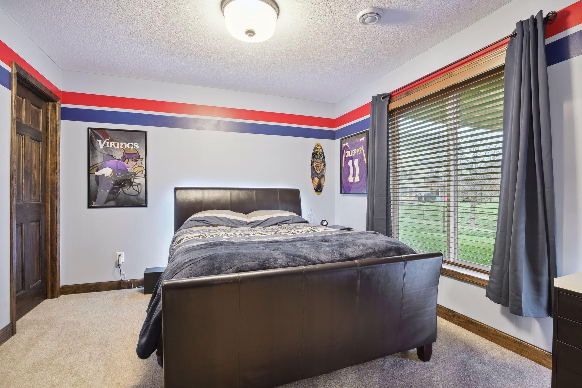 The fifth bedroom is on the lower level.