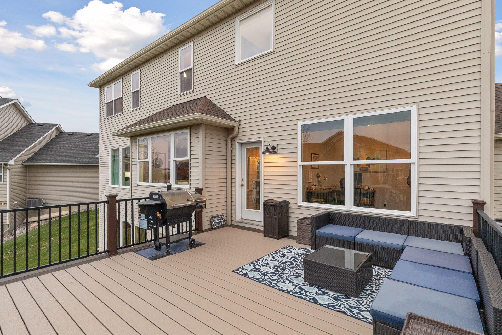 Large composite deck with metal railing.