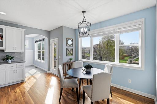 The dinette flows onto the deck or into the sun room