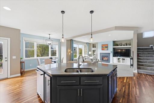 The center island attractively incorporates the sink, dishwasher and casual dining.