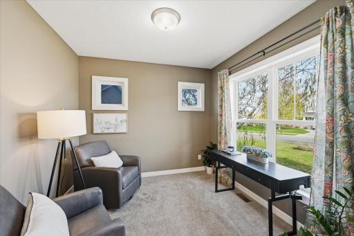 This multi-functional space welcomes you as sitting room or transition into office/play room/library/music or whatever your family needs.