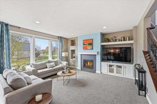 The full wall of windows and architectural accents make this space bright and elegant.