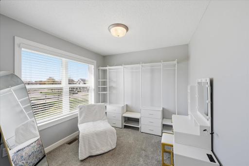 Sitting room is currently used as a third walk-in closet/dressing room