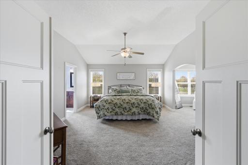 Luxurious owner's suite with sitting room currently used as third walk-in closet