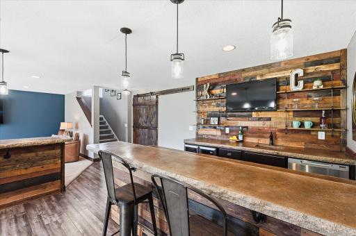 Stylish open shelves and second TV space