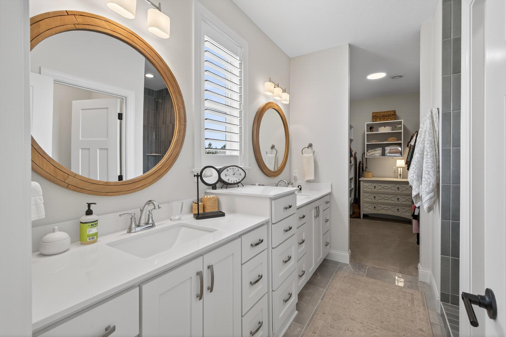 Primary suite with walk-in shower and closet