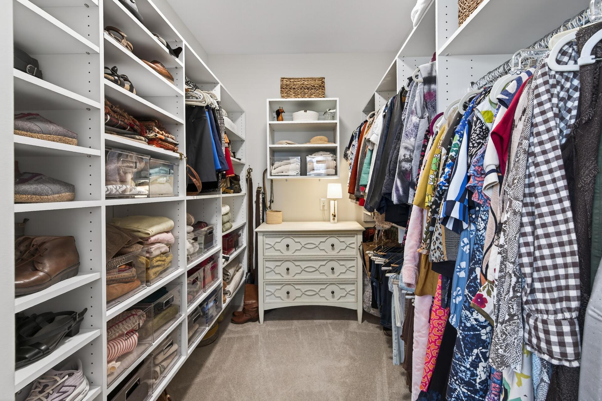 More custom organization in the primary walk-in closet