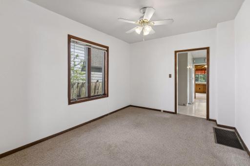 Potential dining space flows from living space to kitchen