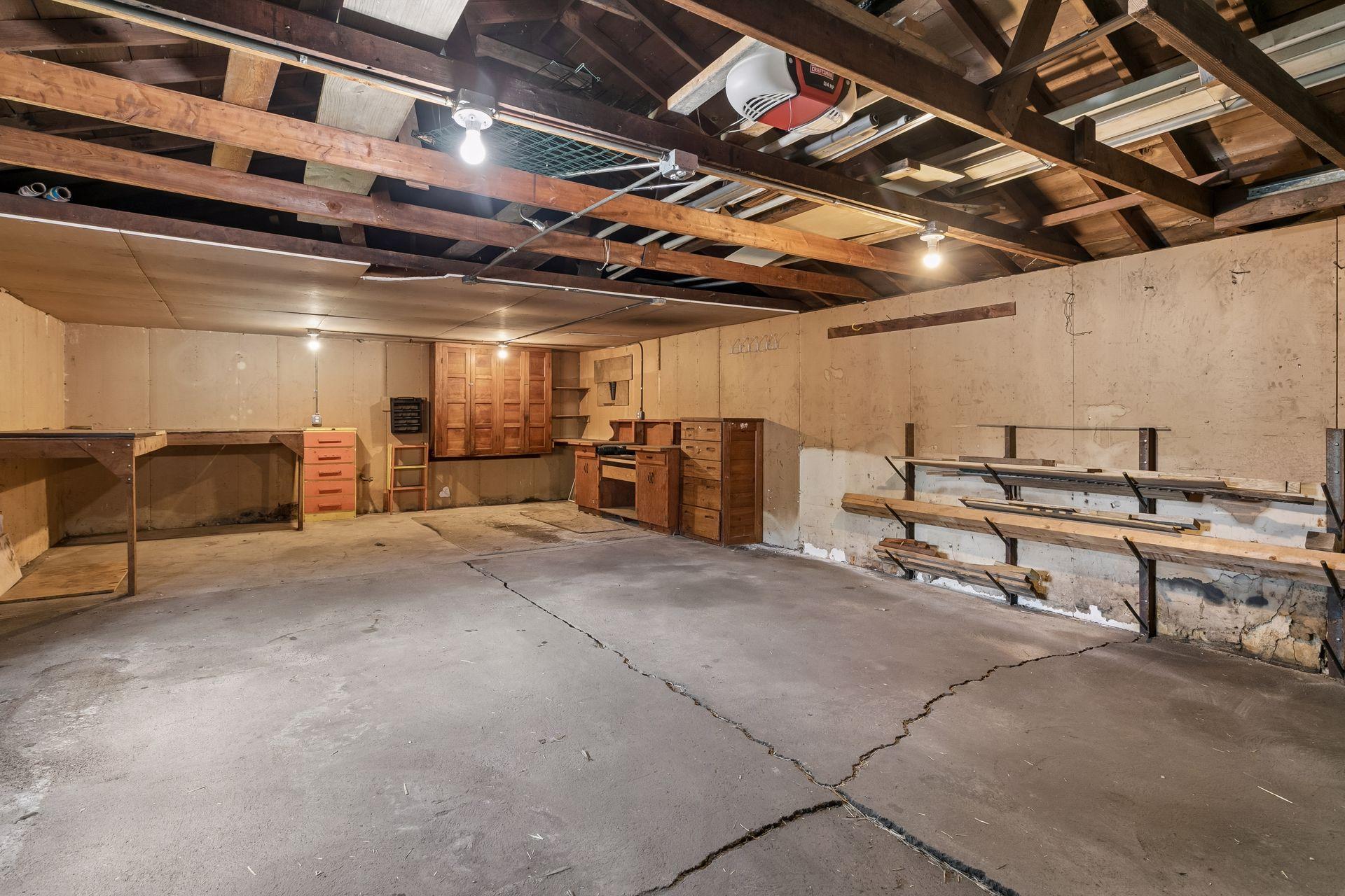 Oversized two-car garage with workbench and storage