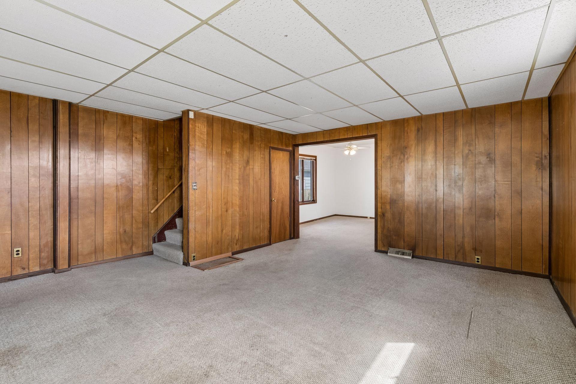 Main level living space flows into flex space that could be used for dedicated dining