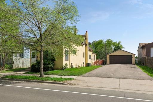 Street view from Front Avenue; driveway access to oversized garage from the street!