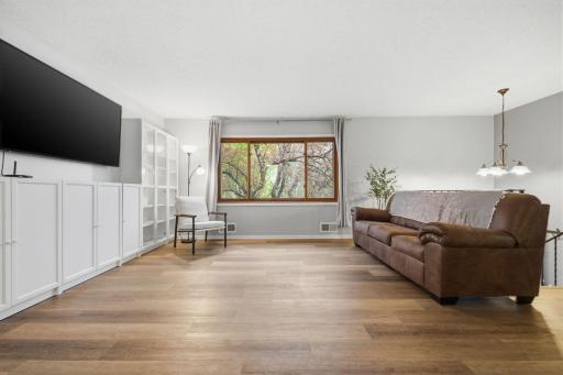 Upper level living room with all new flooring and paint throughout!