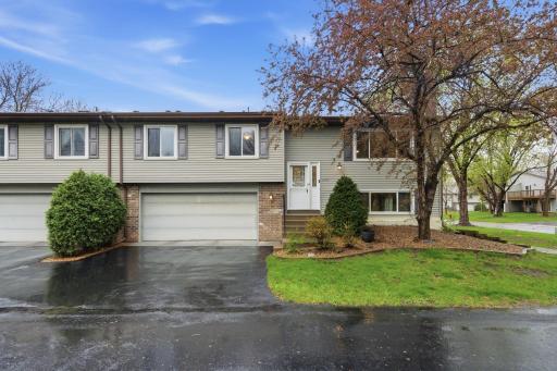 Welcome home! Amazing end-unit in the heart of Maple Grove.