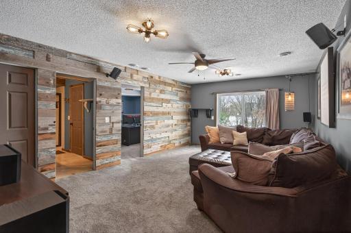 Walkout lower level offers a spacious rec room with direct access to the patio and private backyard.