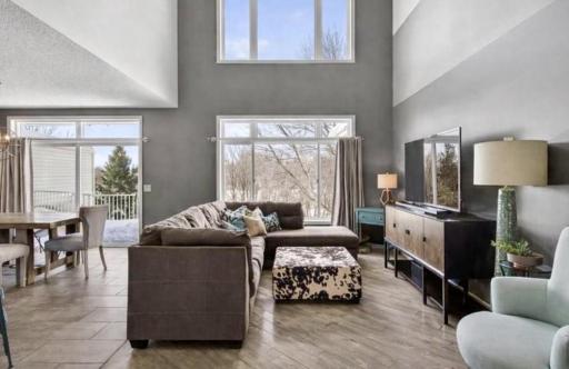 Two-story vaulted great room: Dramatic two-story family room filled with natural light creates a bright, open gathering space.