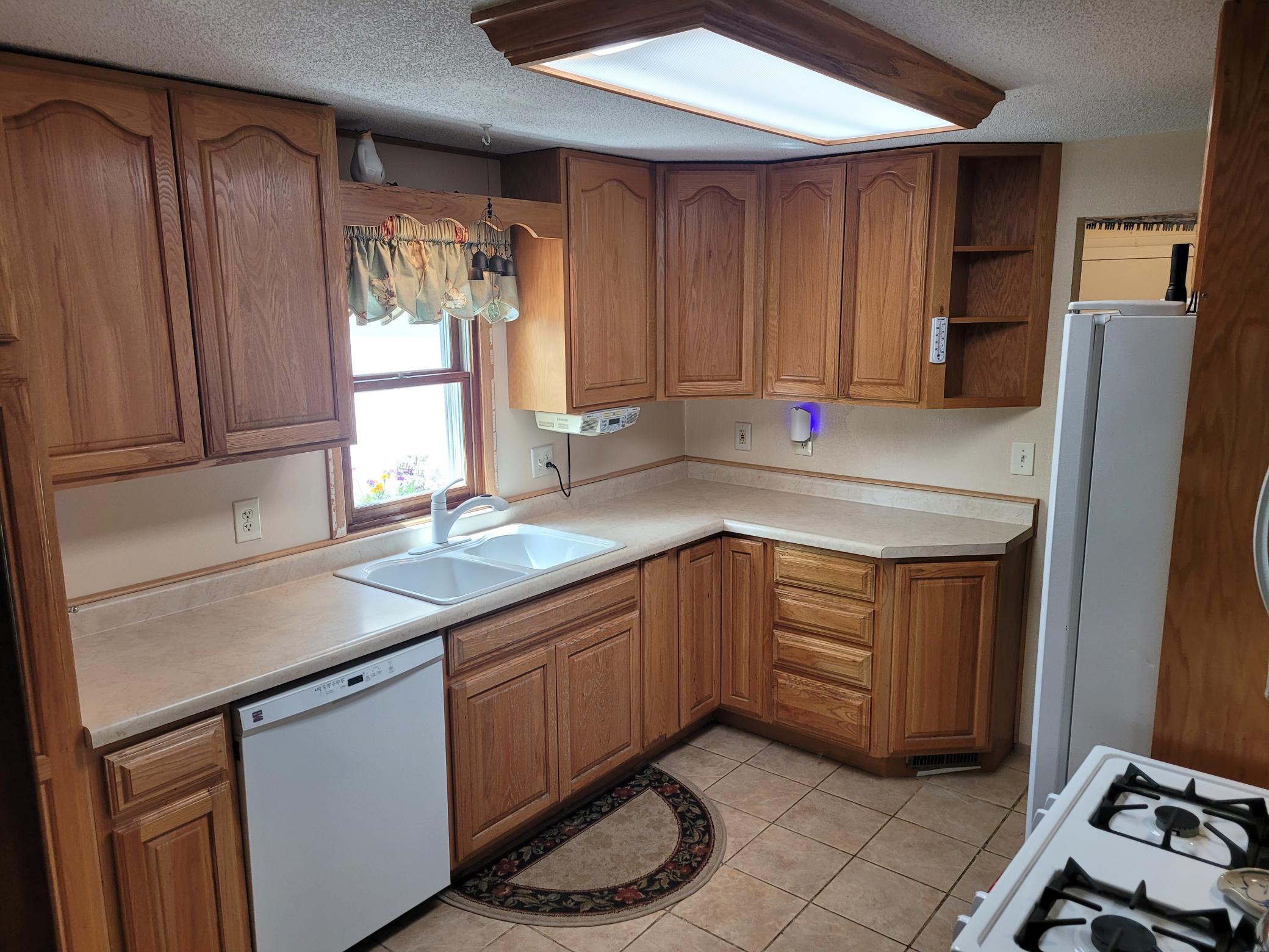 updated cabinetry in kitchen.