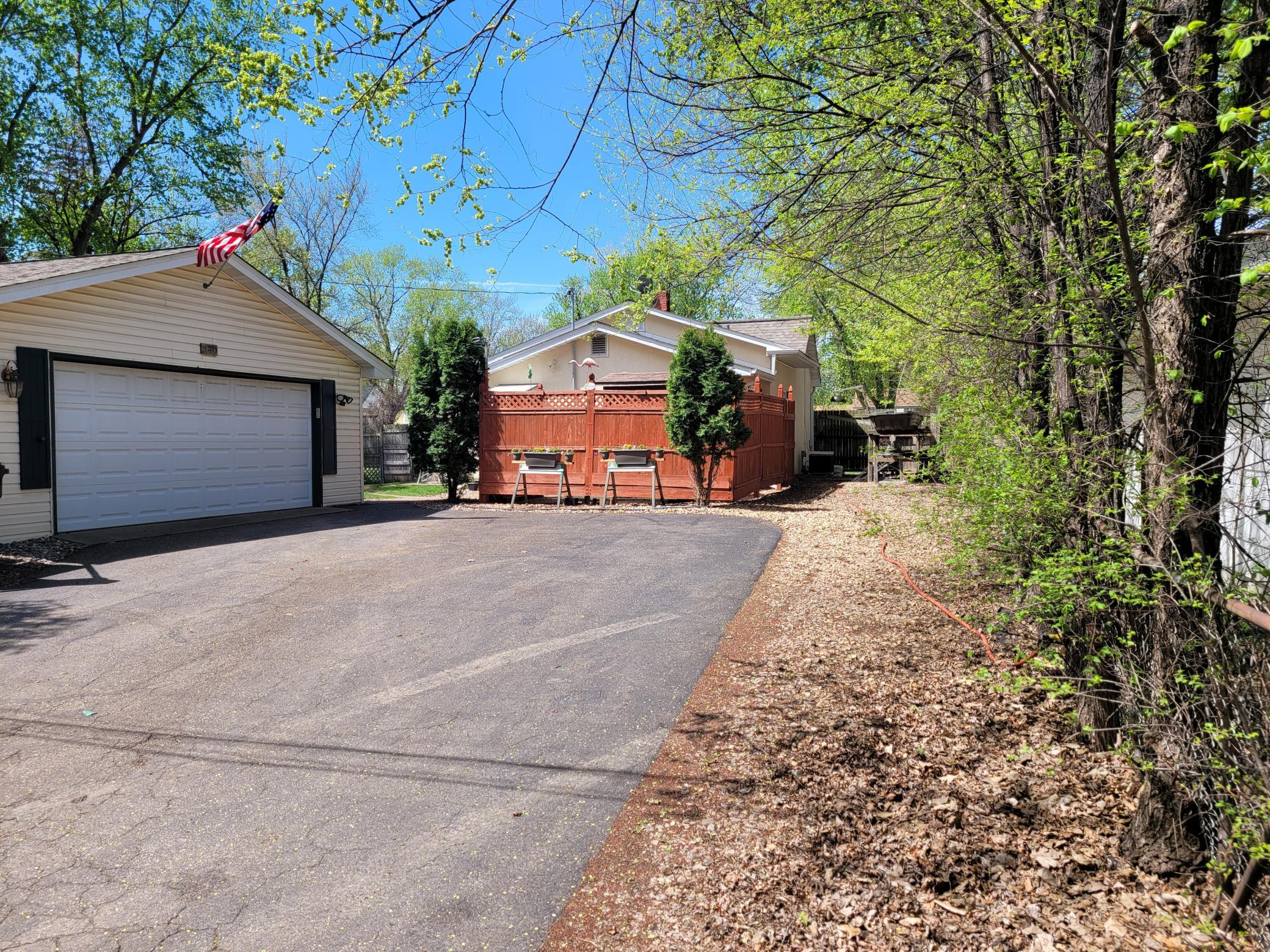 The large 2 car garage is heated and sheetrocked.