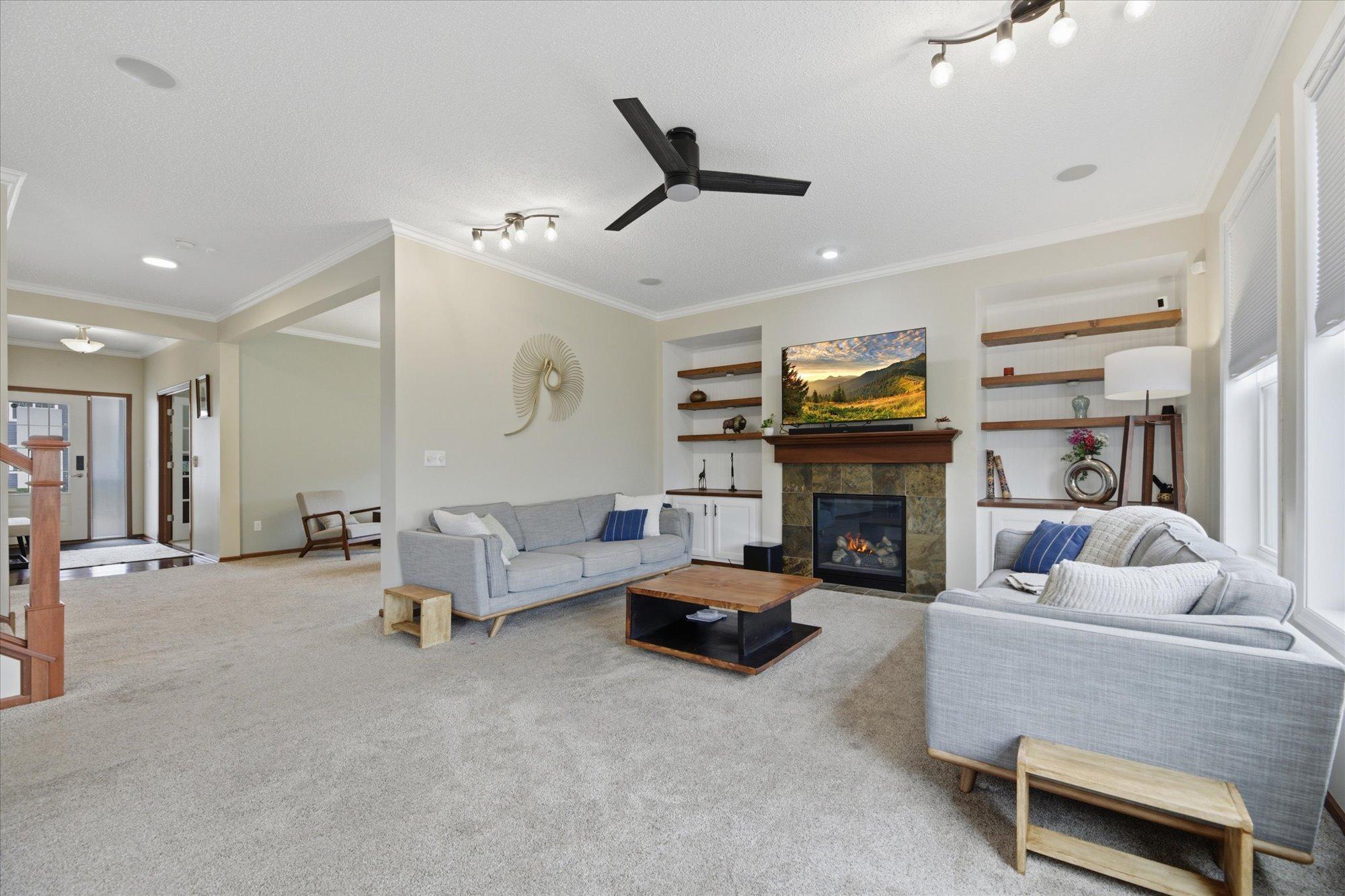 Great living room with built ins and fireplace
