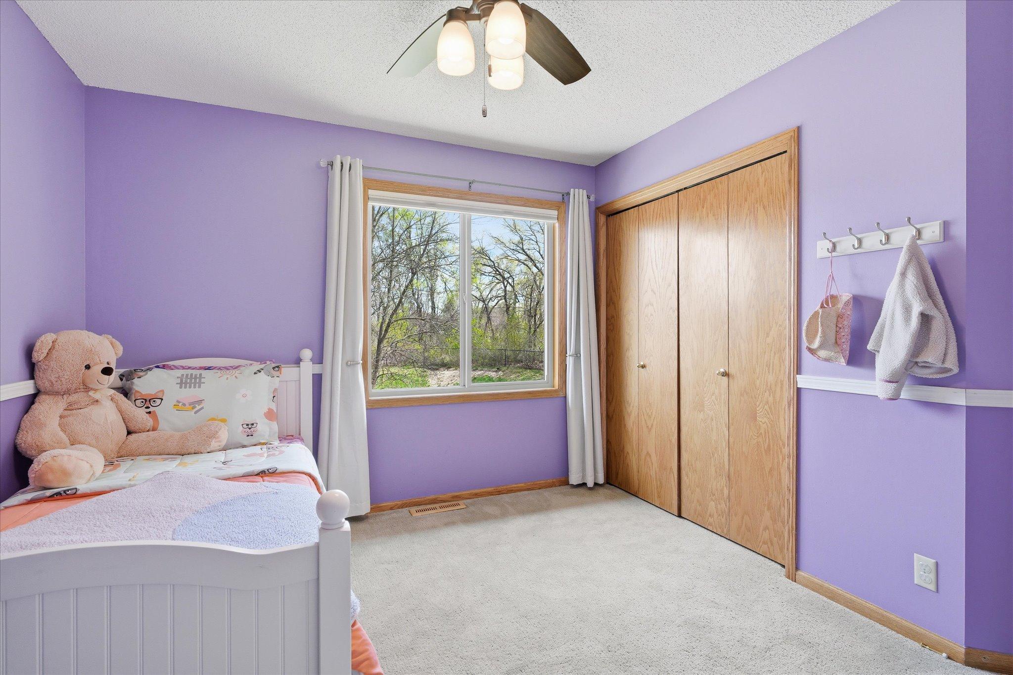 Like the other two bedrooms up here, this room has a beautiful modern ceiling fan.