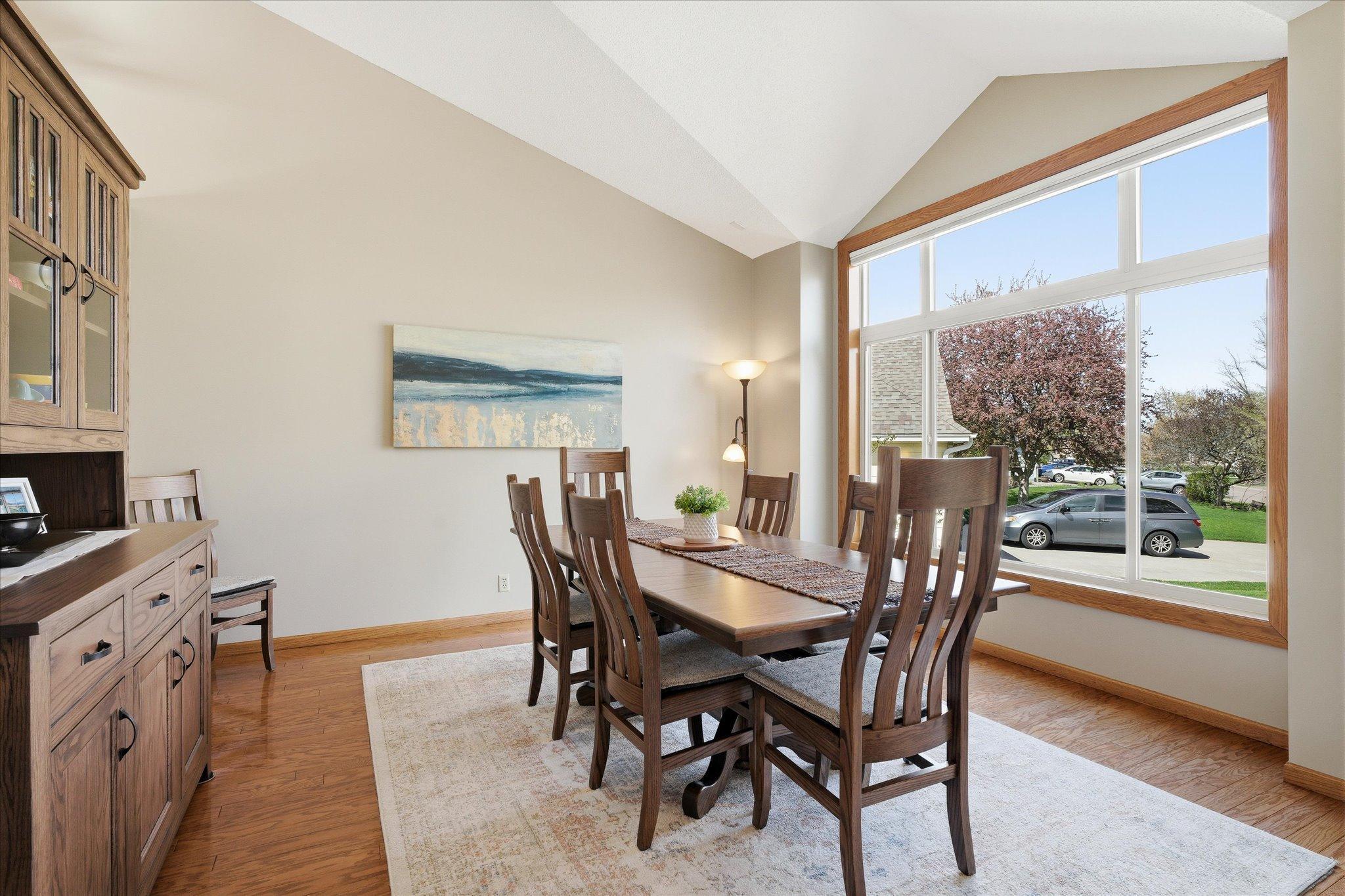Look at the enormous window! It's huge and soooo much natural light floods the space through it. And it was new in 2022! There is a cordless top-down/bottom-up shade too, just in case you want some privacy.
