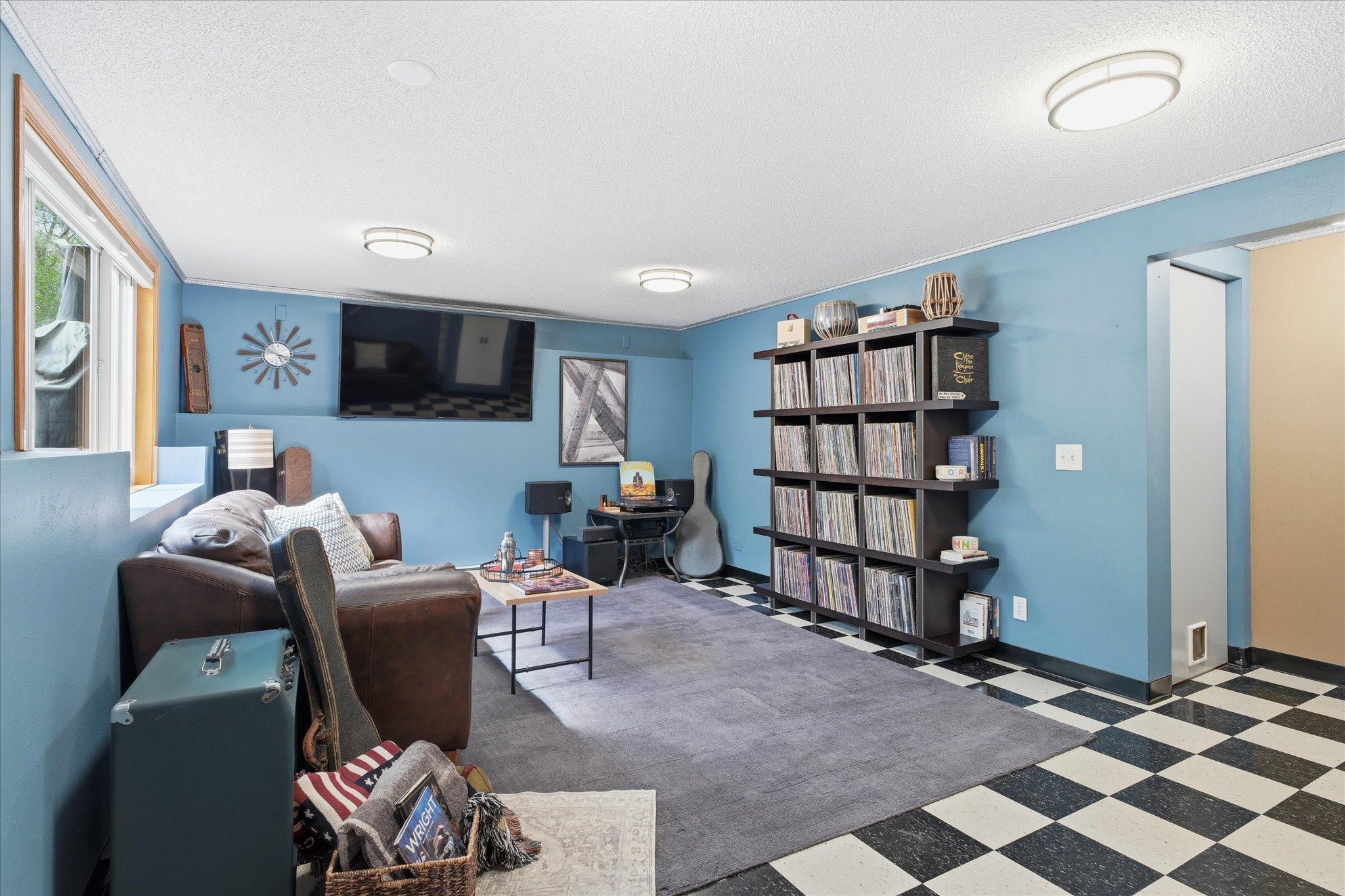 There is loads of overhead lighting down here, and this space is heated by electric baseboard heaters, so when you don't want to heat the space, you don't have to. And when you want it to be nice & toasty, it can be!