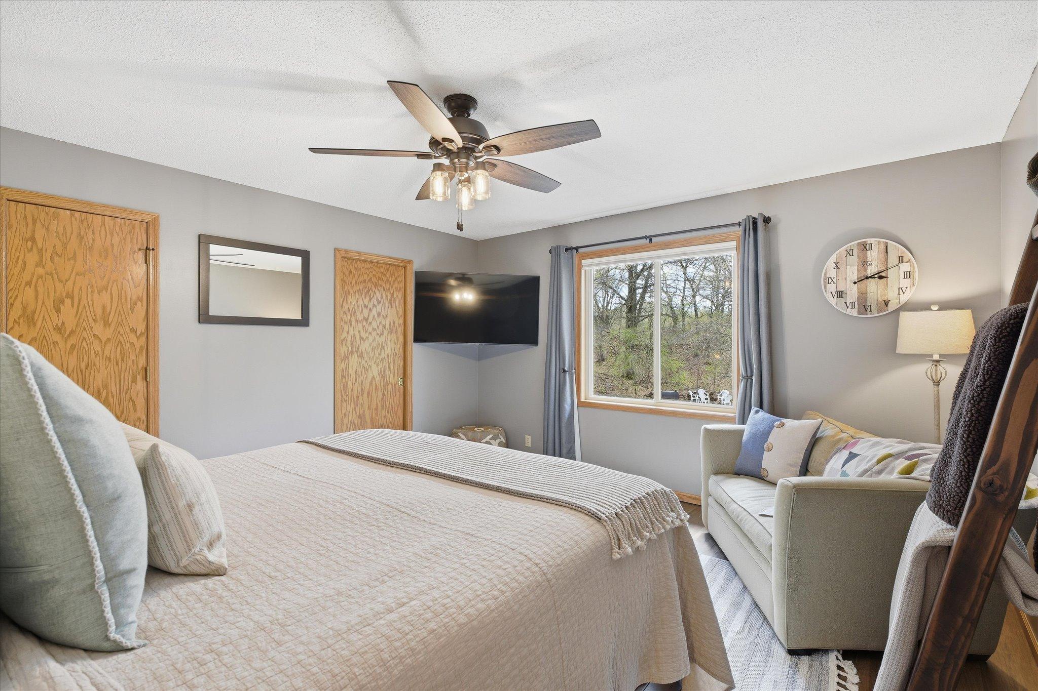 The door on the left leads to a custom-built walk-in closet. The one on the right leads to a private full bath!