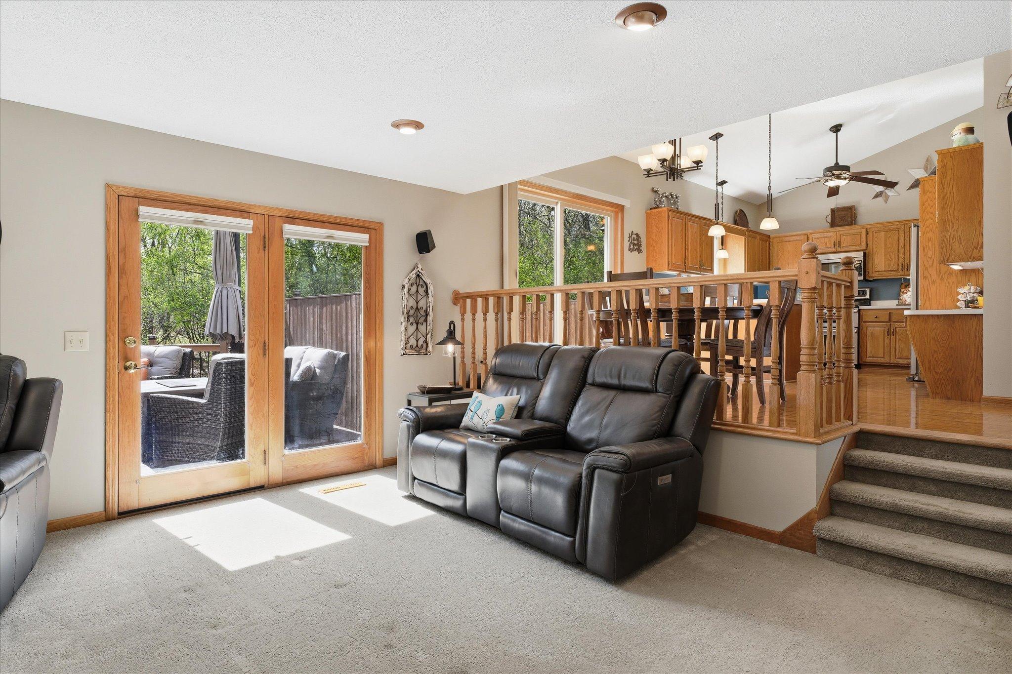 The patio door from this room is a double-width, full-light, natural-light flooding beauty.