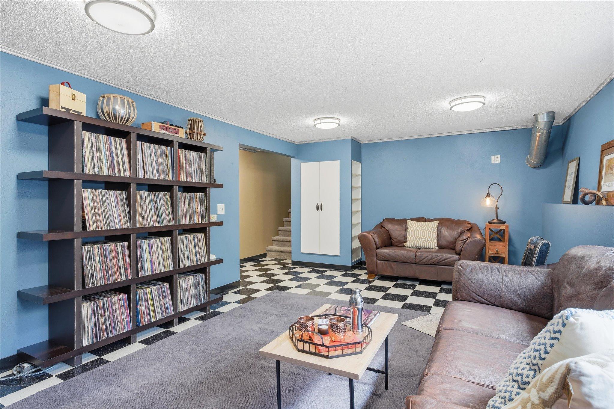 This room can flex. Rec room? Movie night hangout? Workshop? 5th bedroom? Home office? Billiards/game room? Totally your call.
