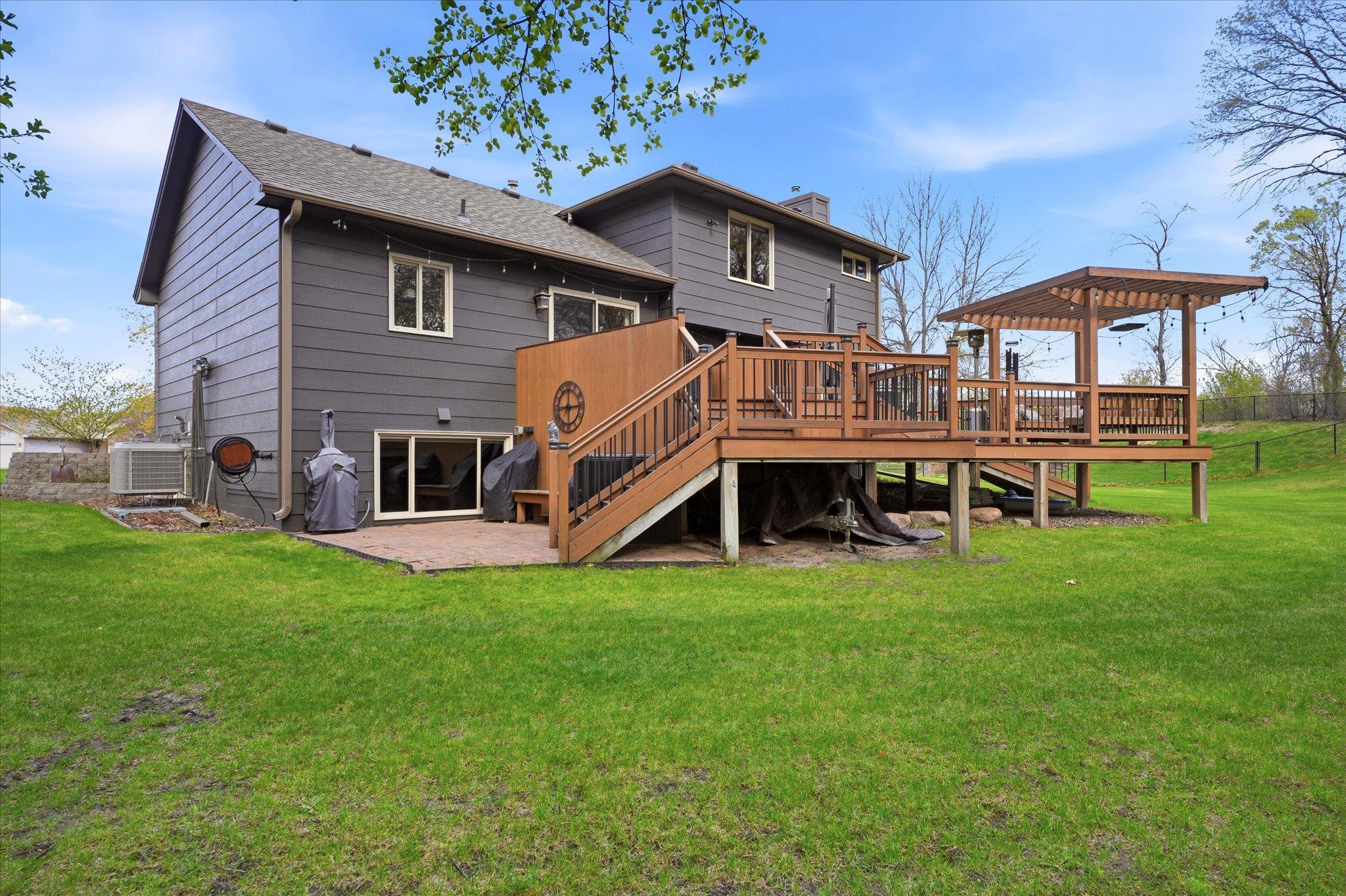 The deck is so enormous, it makes a large patio look kinda small, even though the patio is big too! There are two attached hose reels as well. They thought of everything!