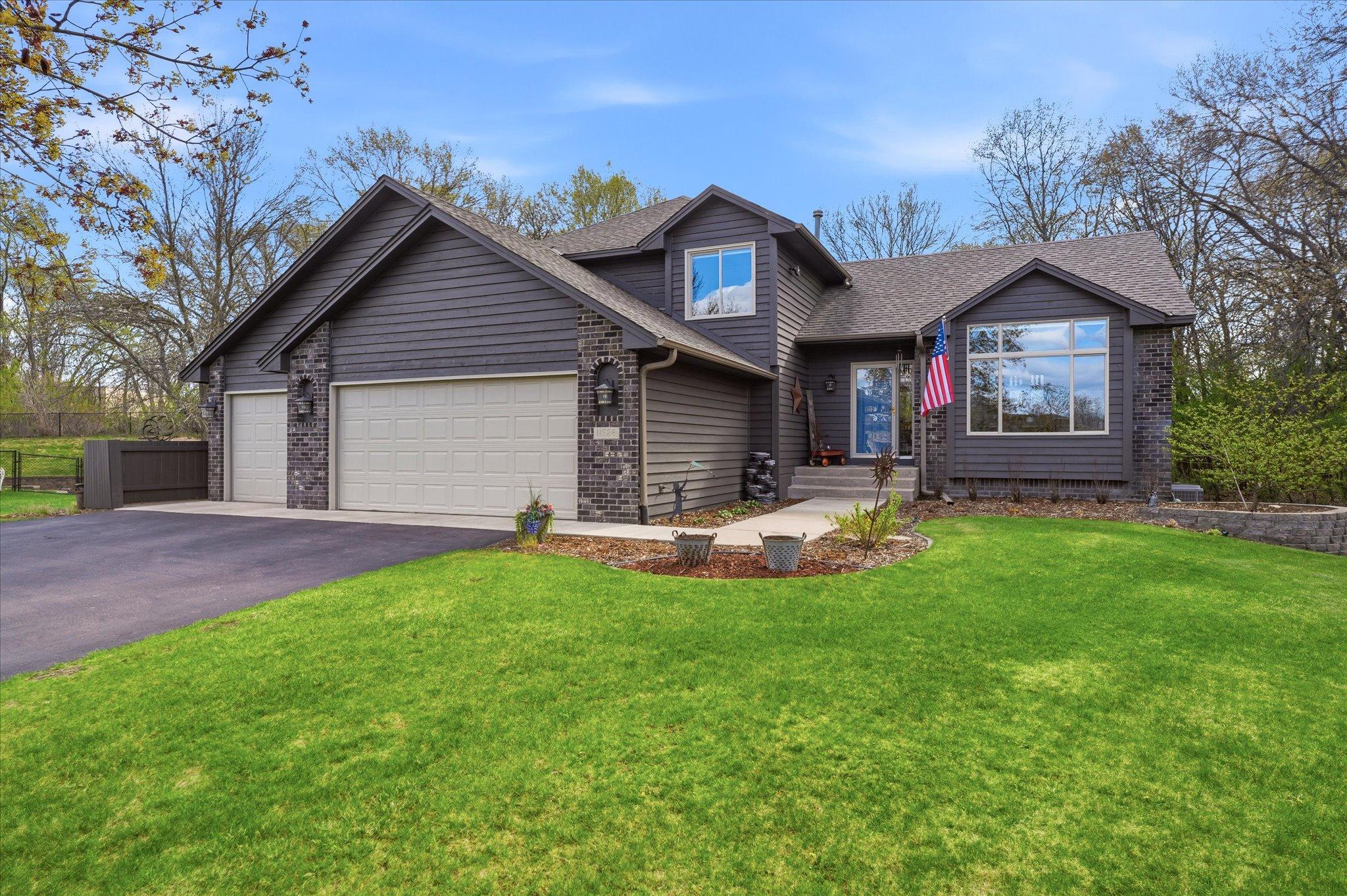 The lawn has been professionally cared for, and the landscaping was overhauled just a few short years ago.