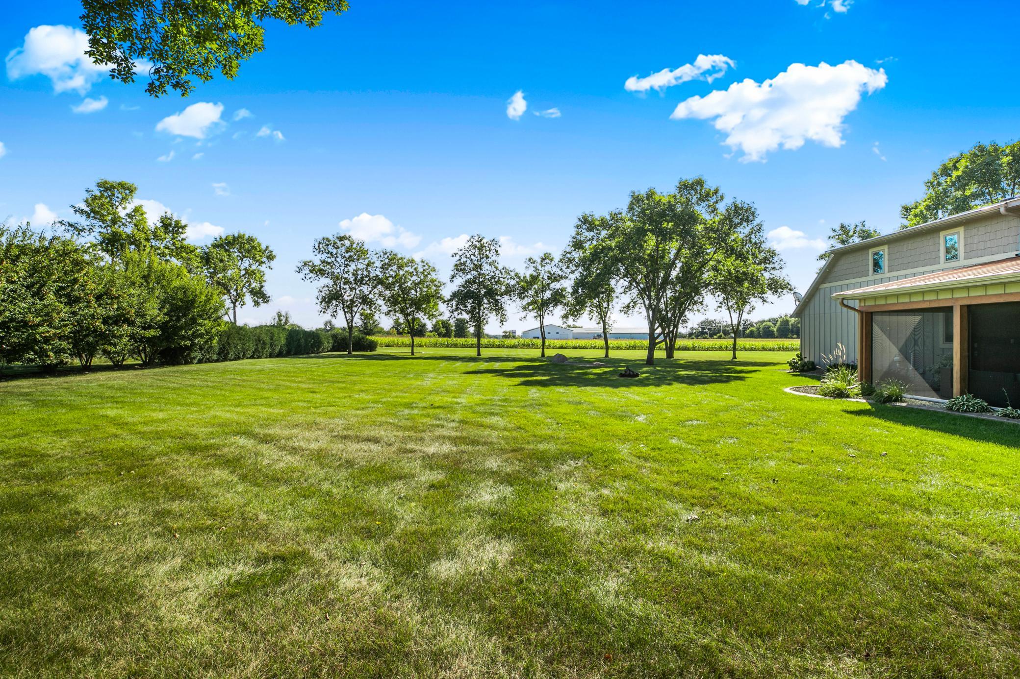 The in-ground sprinkler system will keep the lawn lush and green all summer long.