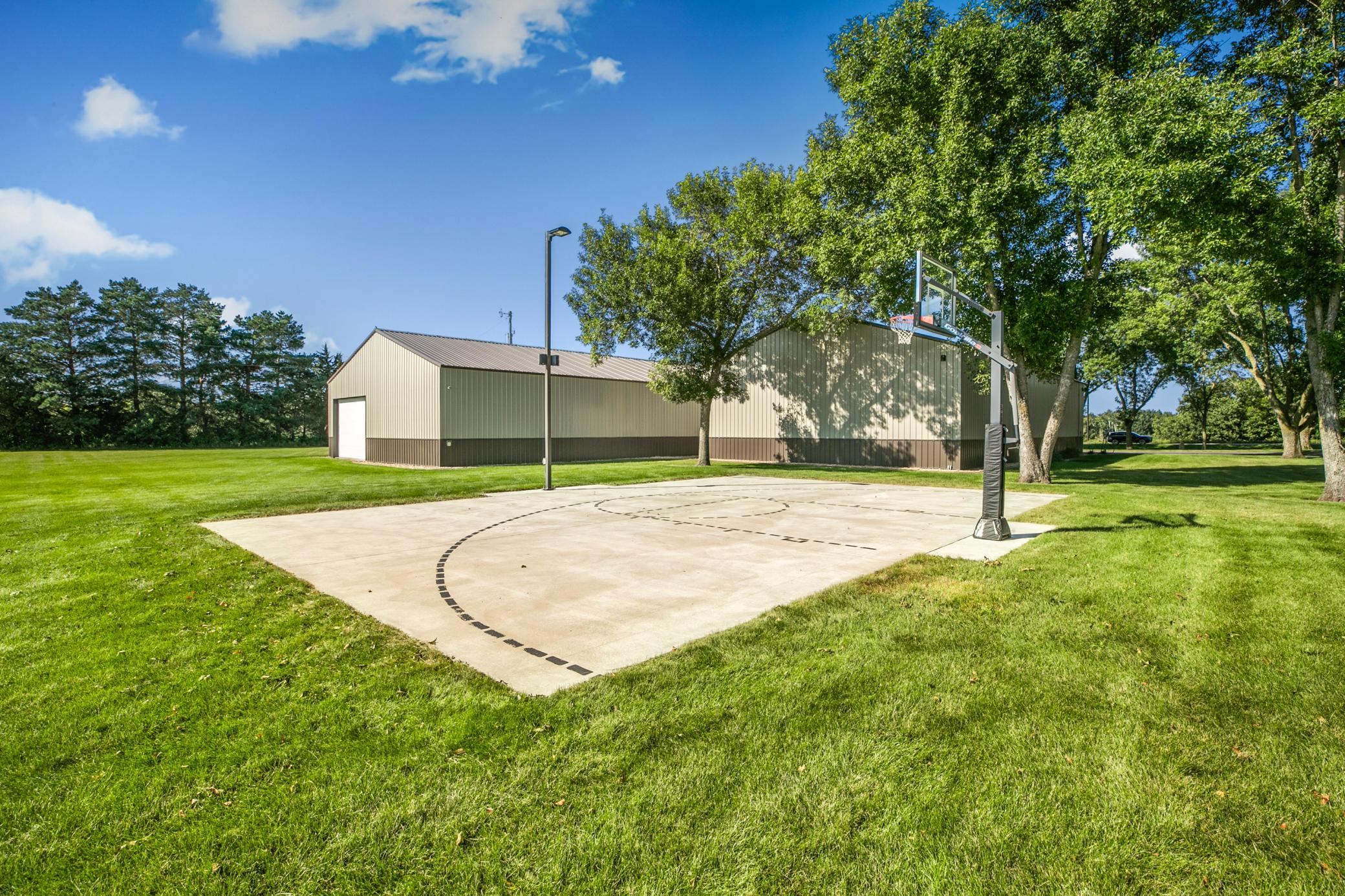 Lit basketball court.