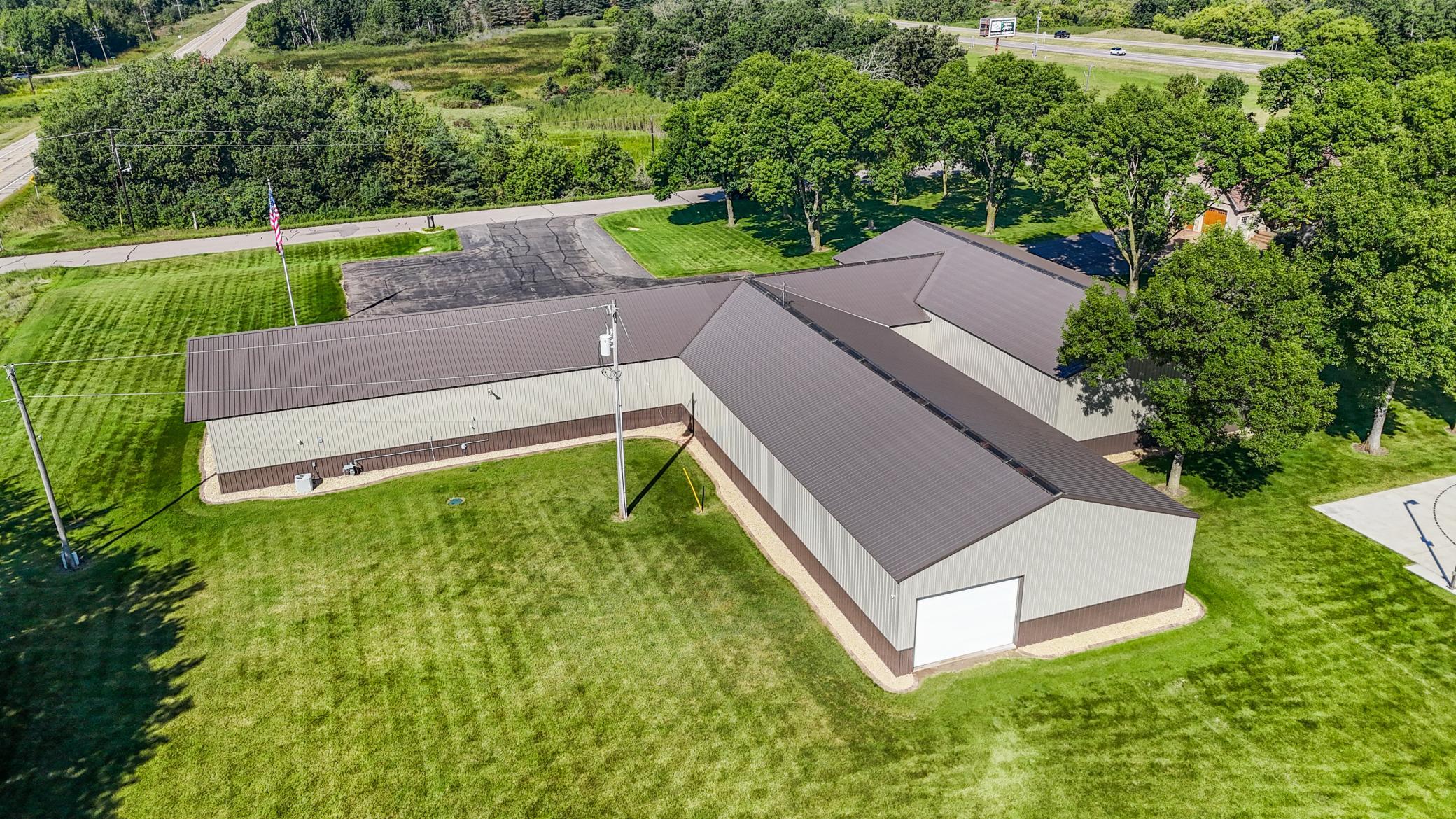 The current owners are still actively running their business from the outbuilding and would be happy to lease the entire outbuilding space for several months post-closing while they complete their new facility.