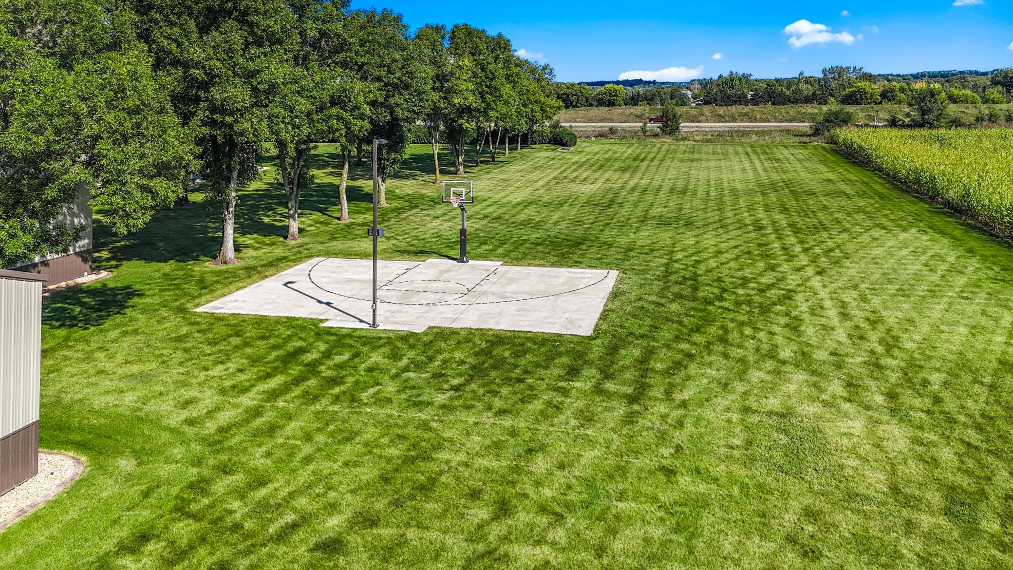 Set on 3.63 acres near trails, a golf course, and lakes, this property offers a perfect blend of luxury and function.