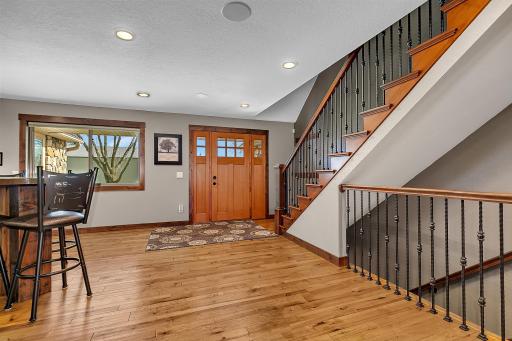 Generous sized foyer for guests to spread out before deciding where they want to head to first. Front door new in 2016.