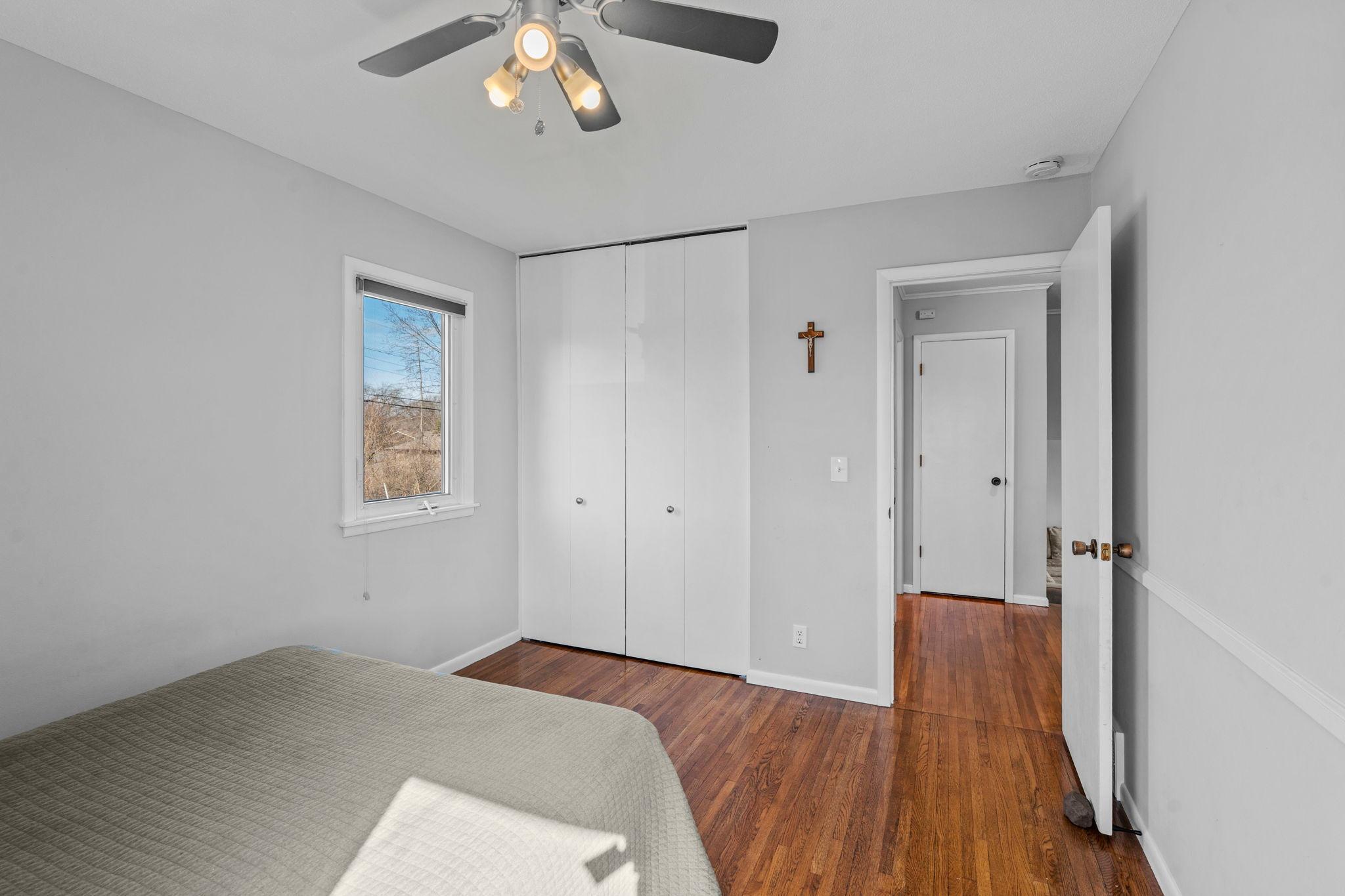 Double windows and beautiful hardwood flooring.
