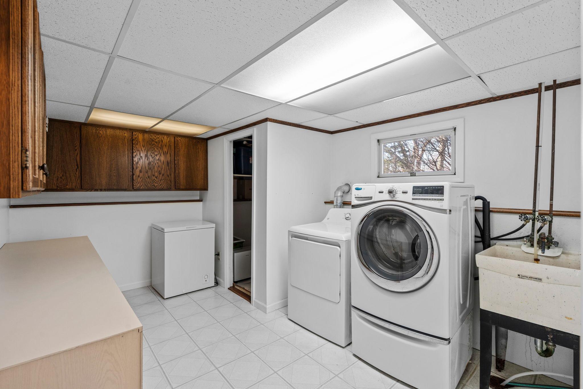 Spacious finished laundry room!