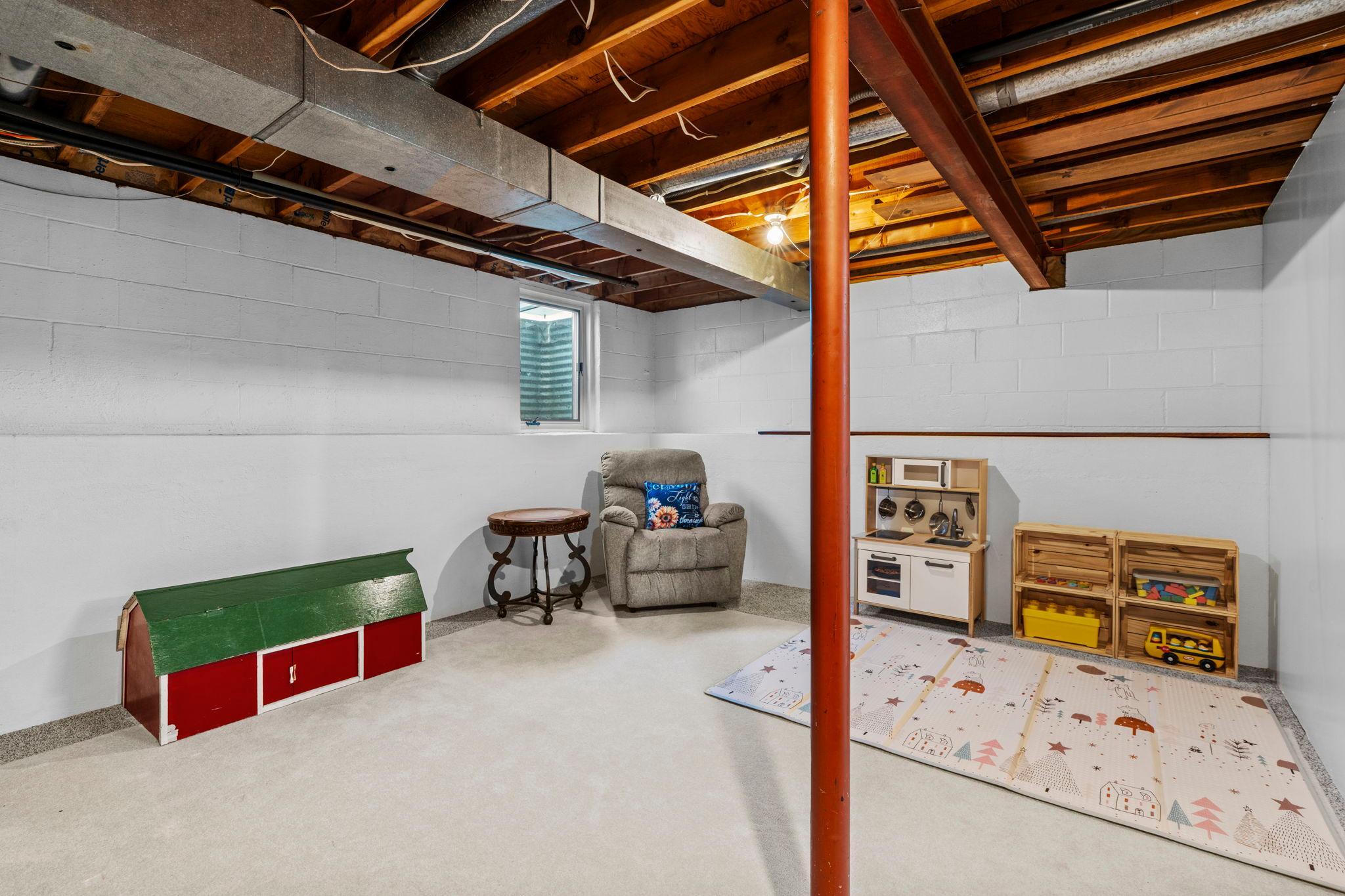 Ample storage or a blank canvas for your future finished space—complete with an existing egress window for a 4th bedroom or flexible use.