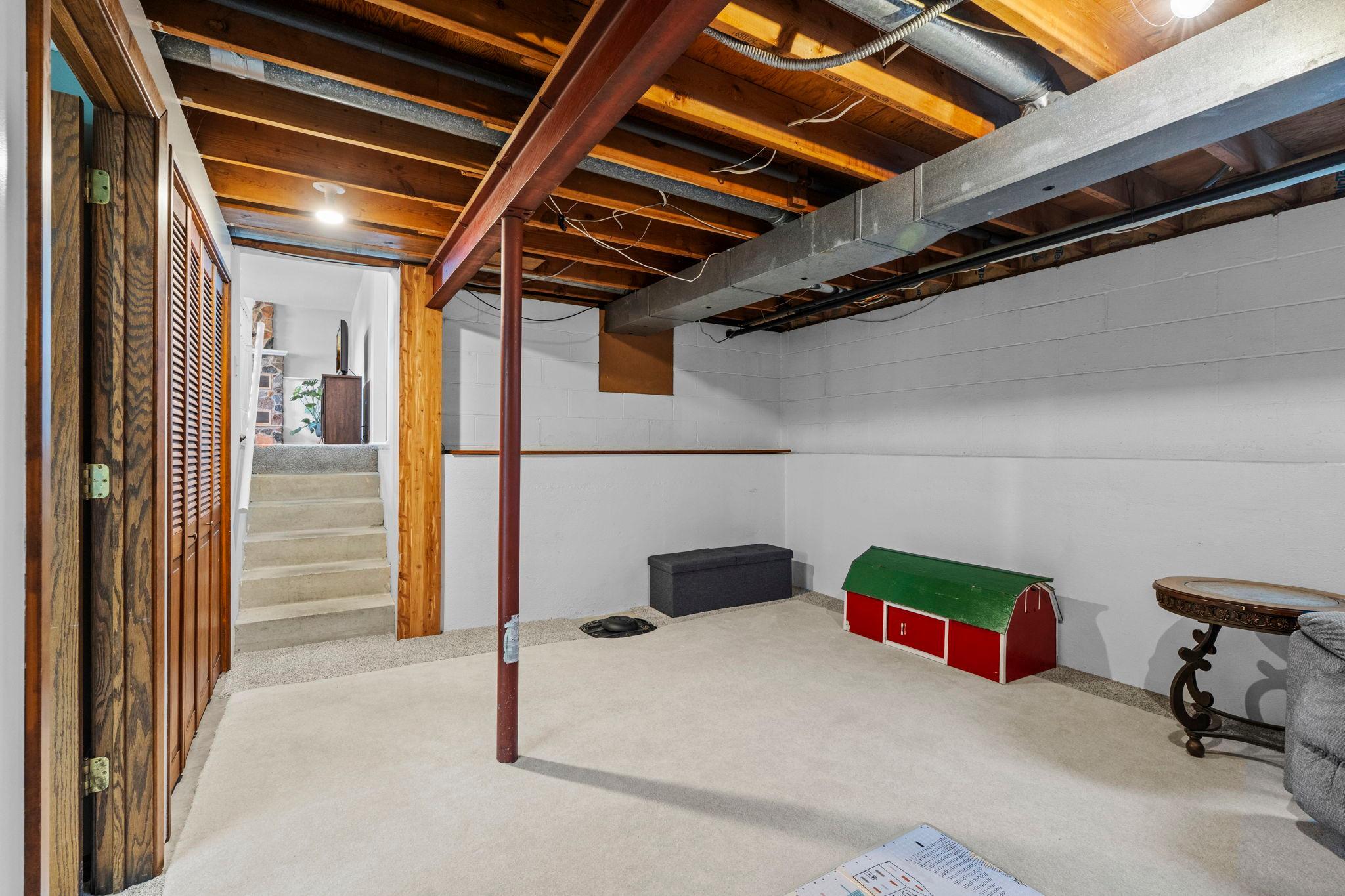 Excellent storage with the opportunity to finish and customize to your needs. Setup as a perfect exercise space or future flex options.