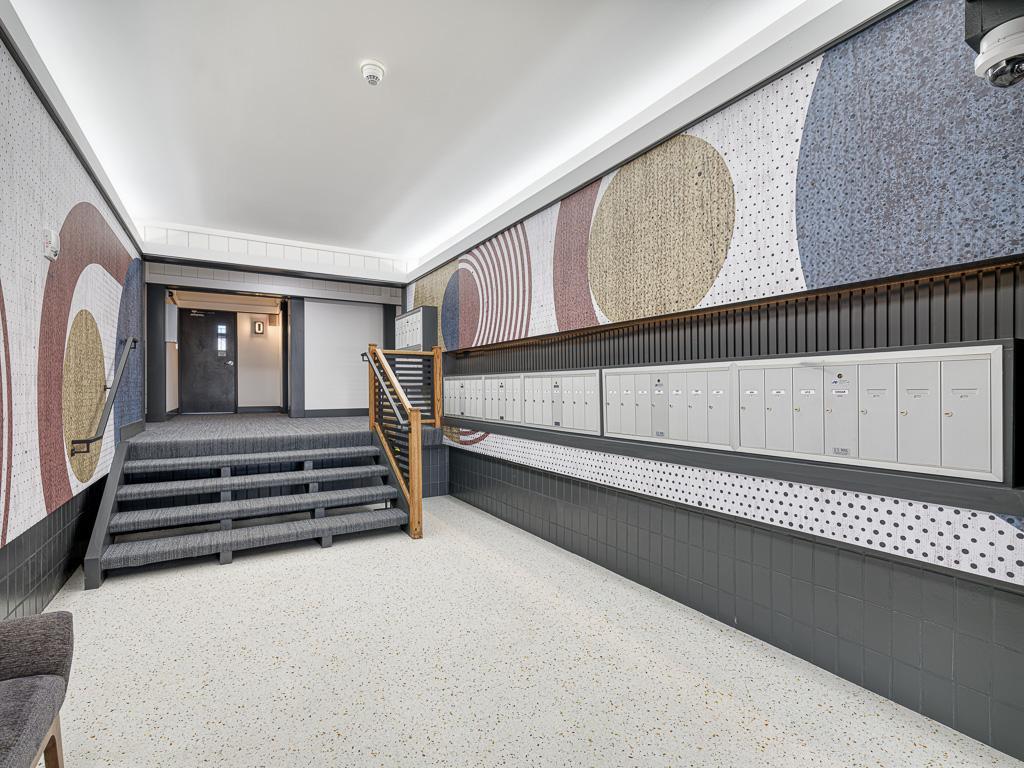 3 - Freshly renovated Lobby with elevator.