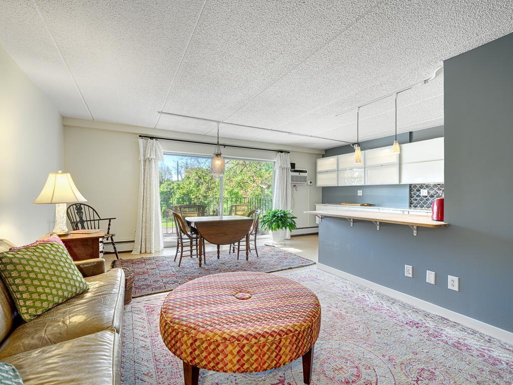 5 -The open living room and dining room offer endless possibilities for furniture arrangement.