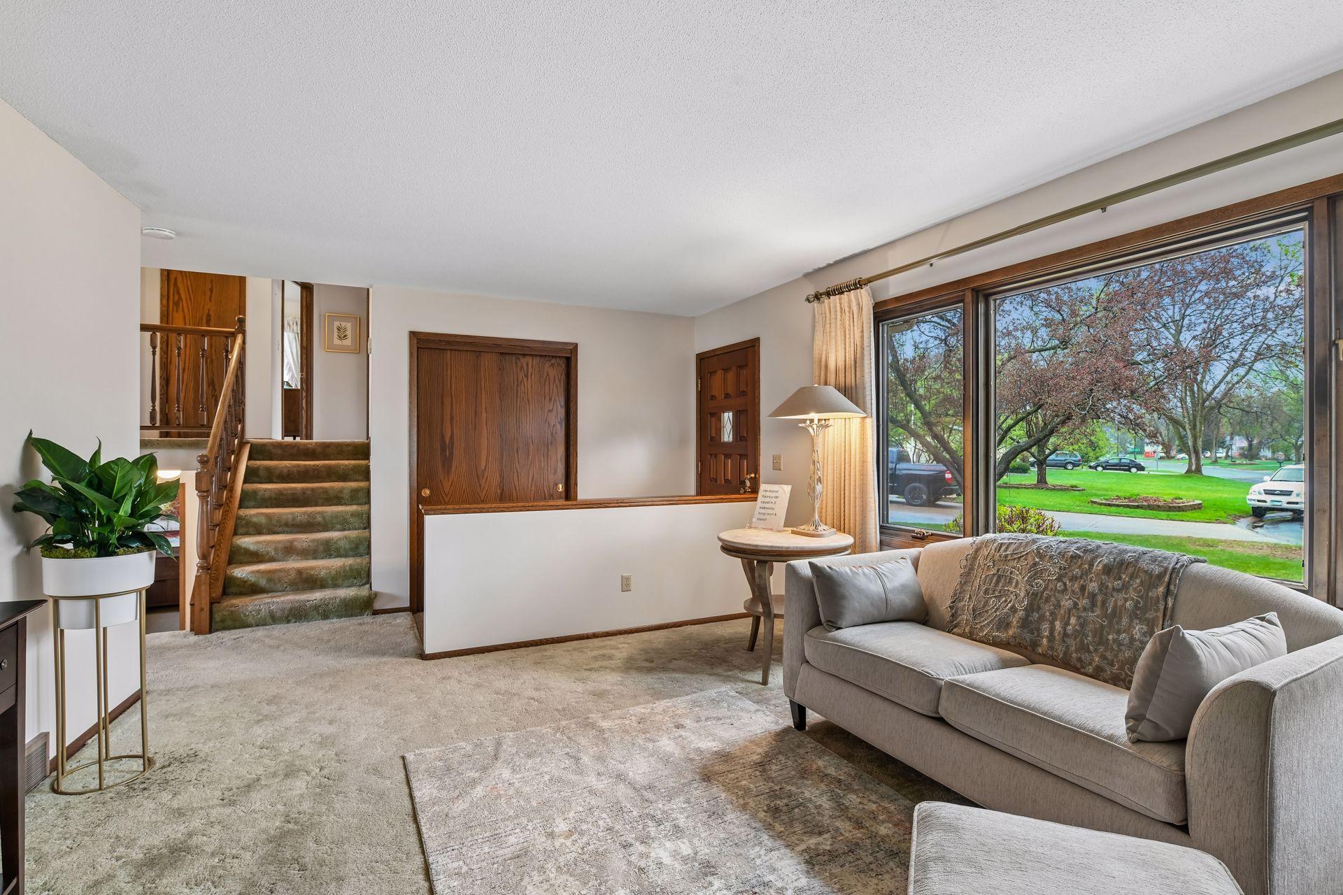 Living room leads to upper bedrooms.