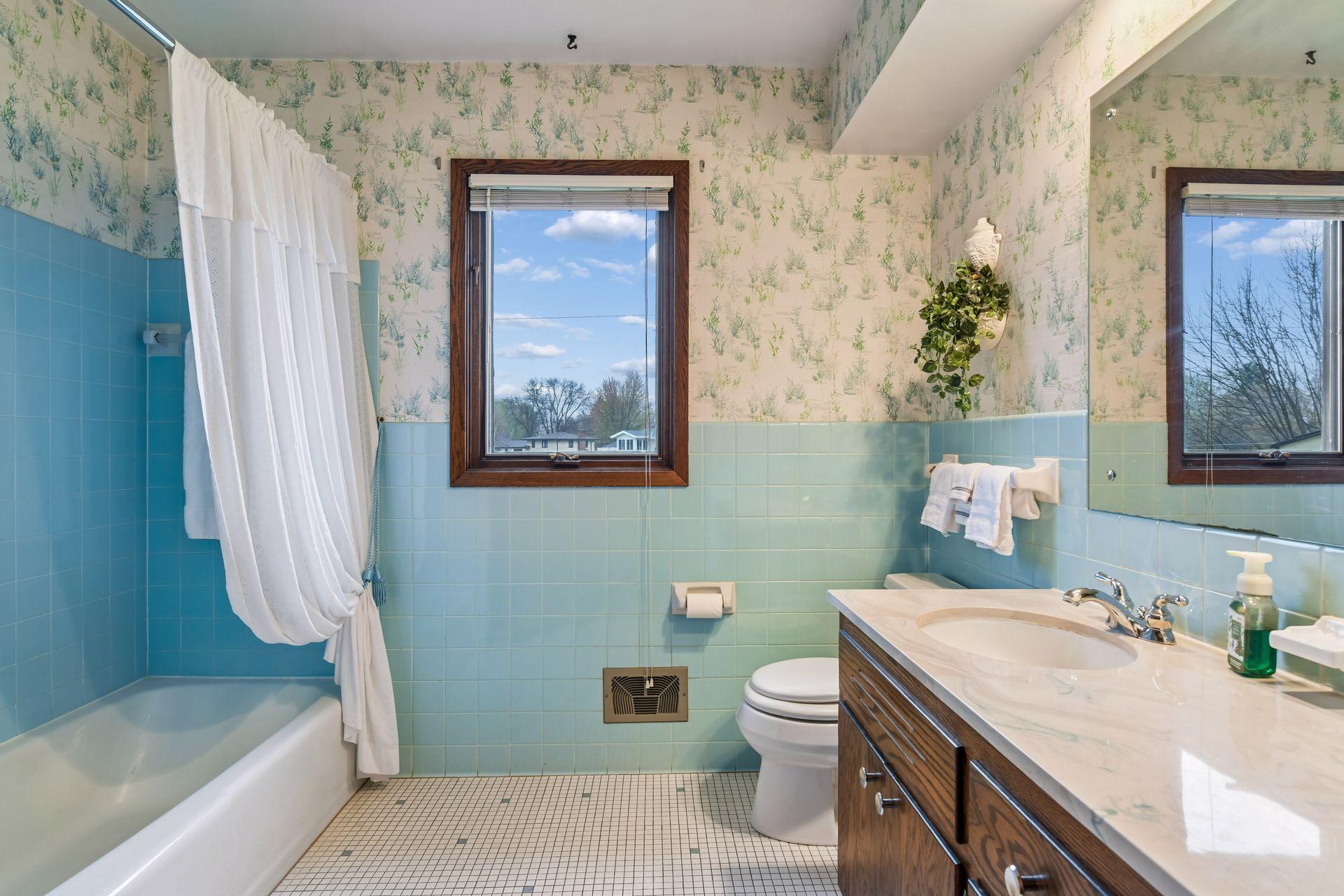 Full bath with extra storage space.