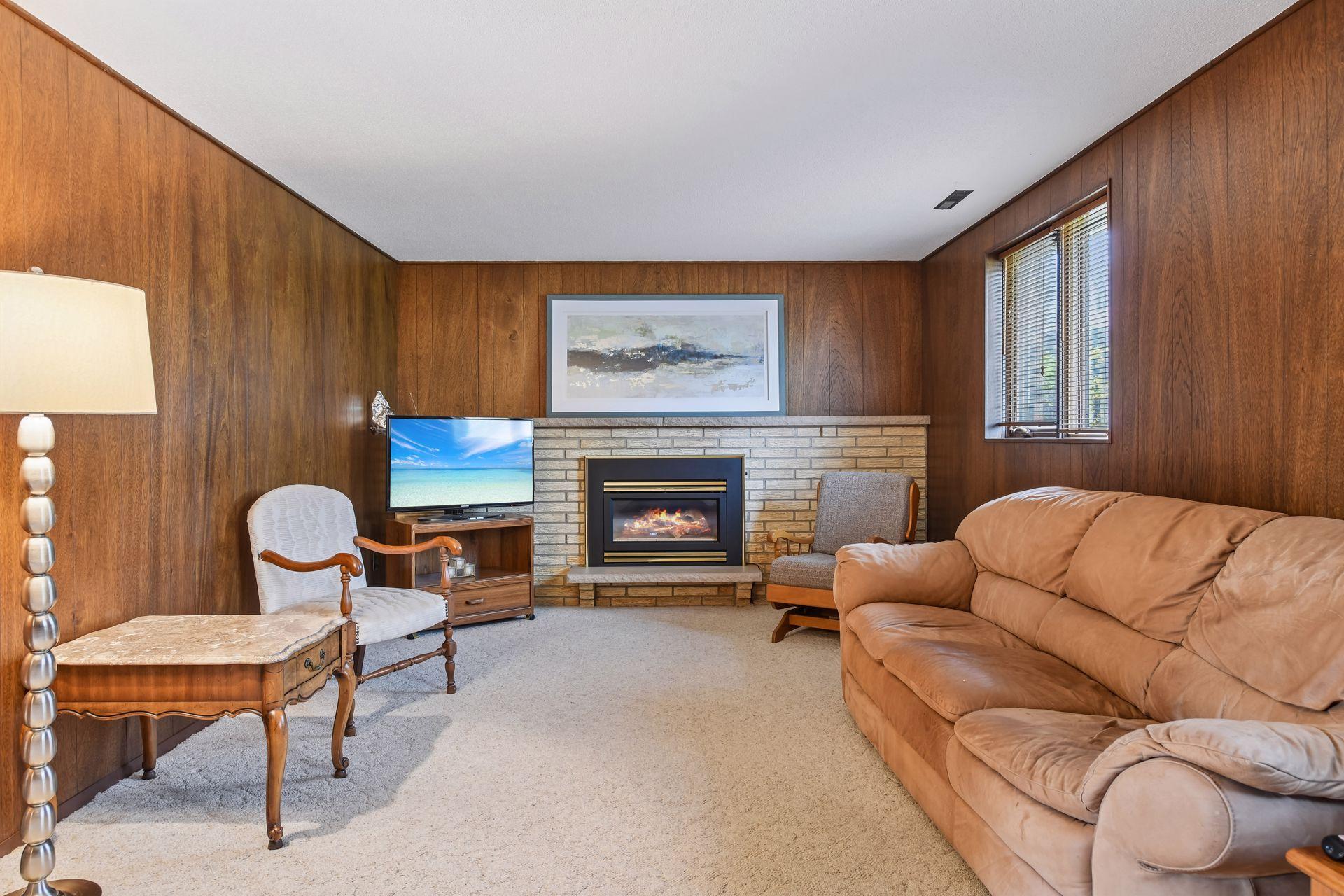 3rd level family room with gas masonry fireplace!