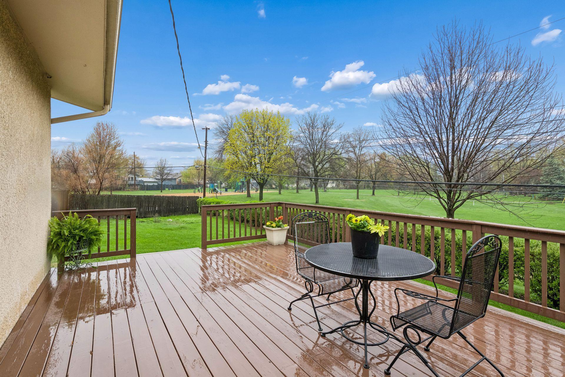 Entertainment style deck with two staircases.