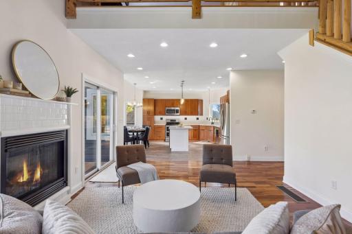 Living room flows into the open kitchen with an island.