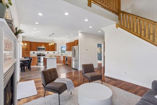 Living room flows into the open kitchen with an island.